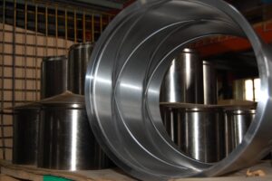 Finished metal parts, showing a variety of fabrication services at SC Industries in Houston, TX.