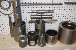 A collection of metal components made by SC Industries in Houston, TX.
