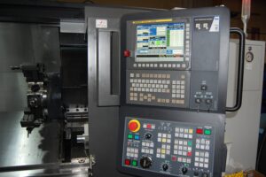 Doosan PUMA 2600SY CNC machine console in operation, at SC Industries in Houston.
