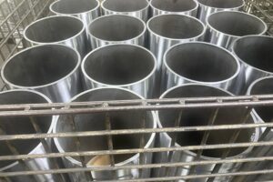 Group of finished metal cylinders in a metal fabrication shop. Group of finished metal cylinders in a metal fabrication shop.