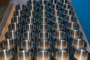 Metal cylinders ready to ship, showcasing the dedication to quality at SC Industries in Houston.