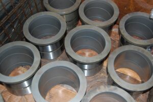 Finished metal parts at SC Industries, showcasing the quality of the finish and the precision of our work.