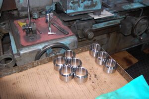 Finished metal parts in quality control at SC Industries.