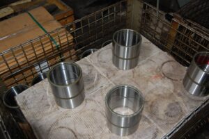 Finished metal cylinders ready for shipping at SC Industries, Houston.